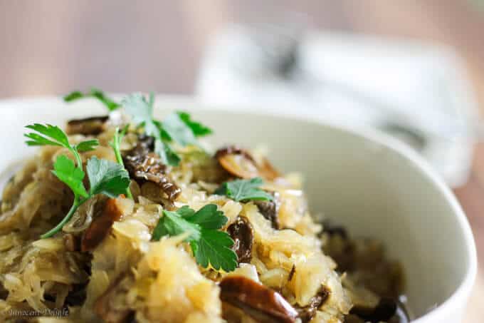 This authentic Polish recipe for Kapusta (Sauerkraut with Mushrooms) is very easy to make and requires only few ingredients. In Poland it is traditionally served on Christmas Eve as a side dish to different kind of fish. Sauerkraut and mushrooms - Polish Kapusta recipe