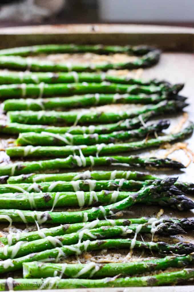 Roasted asparagus with parmesan cheese on a sheet pan