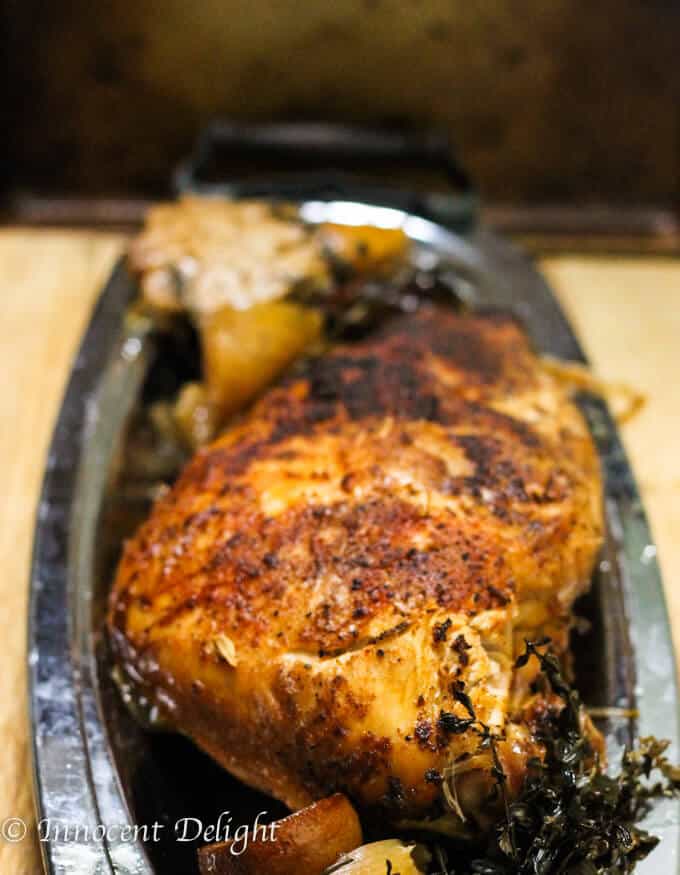 Slow cooker turkey breast - amazing alternative to roasting the whole bird. It is simple., delicious and takes only 5 minutes of prep time - Innocent Delight Slow cooker turkey breast on a serving plate