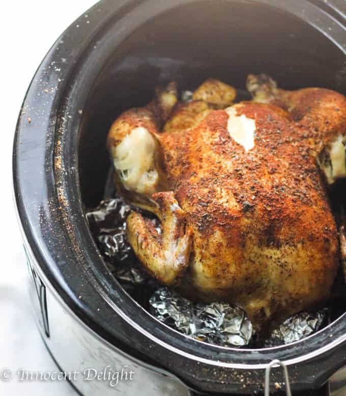 Only 5 minutes of preparation is needed for this amazing Slow Cooker Whole Roasted Chicken. Spice it up. Set it and forget it. The most juicy chicken you could ever imagine.