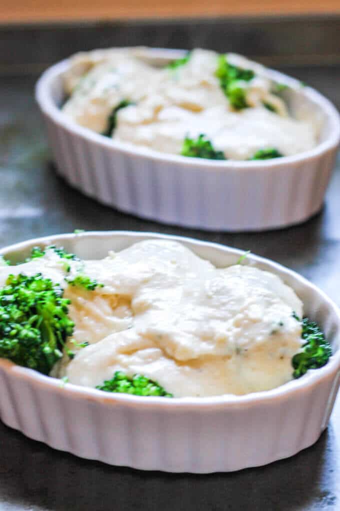 Cheesy Broccoli Au Gratin is a delicious dish that features America's favorite vegetable, topped with amazing cheesy sauce that is baked to perfection. Just a few simple ingredients, mixed with the sophistication of a Gruyere cheese, marry together to make this dish both rustic and elegant. Even broccoli critics can become converts. Broccoli in ramekins covered with cheese sauce