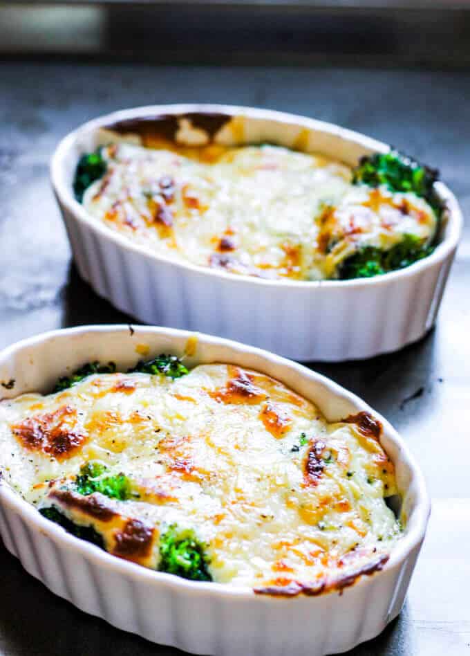 Broccoli Au Gratin is a delicious dish of American favorite vegetable topped with amazing cheesy sauce that is baked to perfection. Few simple ingredients mixed with sophisticated Gruyere cheese makes this dish both rustic and elegant. Even broccoli skeptics can become a fans.