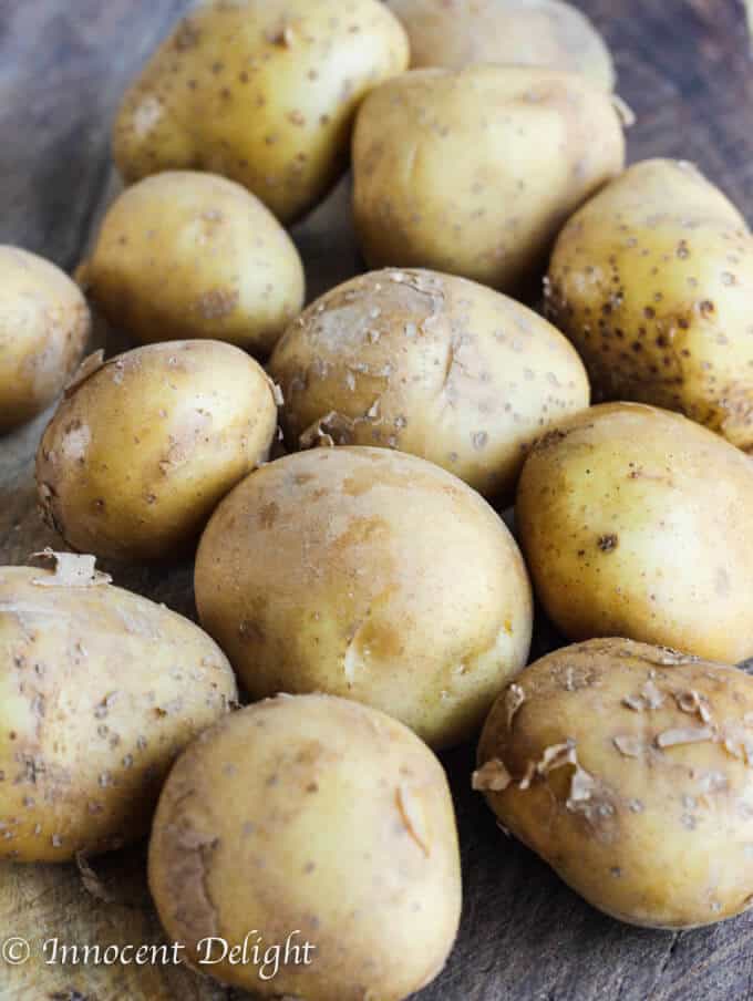 New Dill Potatoes with Scallion Cream Sauce - Polish summer staple side dish. This type of potatoes are the creamiest out there and they are only available for the short period of time. Hurry up, get some on your local farmer's market and follow this recipe to try the best potatoes you have ever tasted.