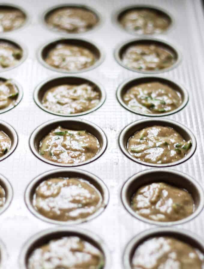 Healthy Mini Zucchini Muffins - these super easy, mini sized, one bite, whole wheat healthy muffins are a treat that every kid would love.