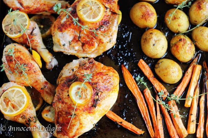 One Pan Herbed Lemon Chicken with Veggies Recipe - quick and easy dinner that requires minimal preparation that takes 5 minutes. The oven does the job for you.