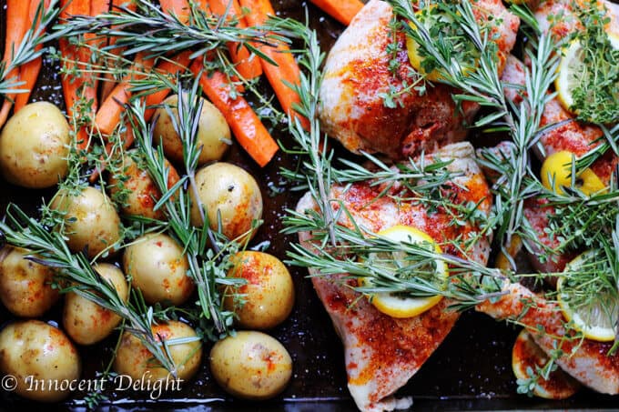 One Pan Herbed Lemon Chicken with Veggies Recipe - quick and easy dinner that requires minimal preparation that takes 5 minutes. The oven does the job for you.