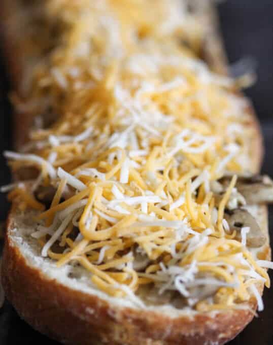 Open Face Mushroom and Cheese Sandwich - famous Polish street food called Zapiekanka or Zapiekanki in plural. You can find them on every corner in Poland.