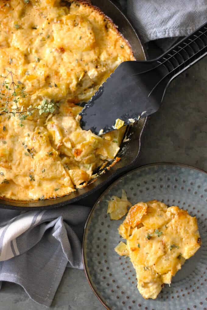 Potato Leek Casserole - ultimate comfort food side dish that resembles in taste famous Potato Leek Soup; topped with cream and Gruyer Cheese, rich, decadent, elegant and delicious casserole- Innocent Delight
