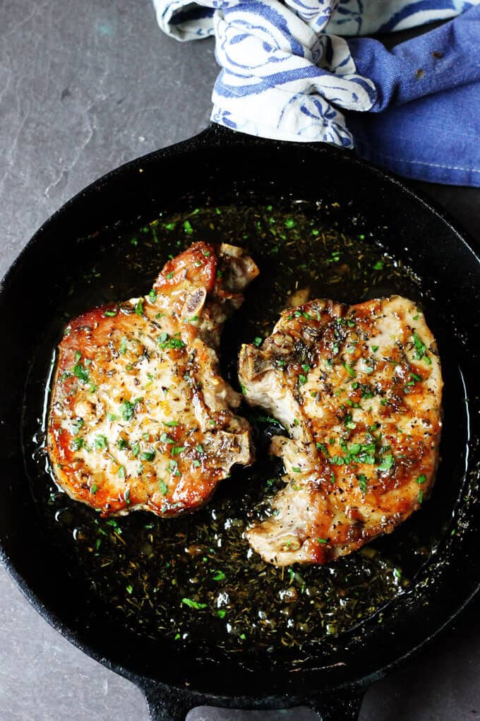 Brown Sugar Pork Chops with Garlic and Herbs are as delicious as they sound. The sweet brown sugar sauce is perfectly balanced by garlic and dried herbs like thyme and oregano. Juicy pork chops dish that comes together in no time.