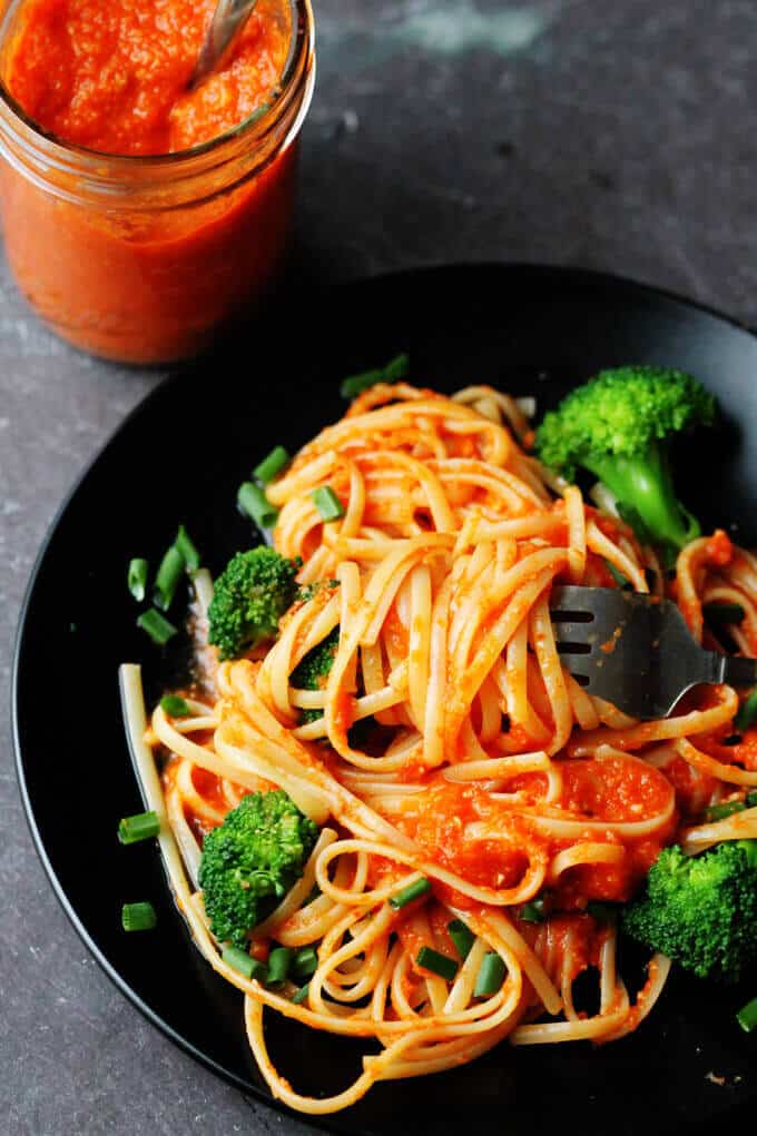 Linguine with Broccoli and Romesco Sauce is an amazing pasta dish with a uniquely Spanish twist. Freshly cooked linguine is tossed with broccoli and a sauce made of roasted red peppers, tomatoes, onions and toasted almonds. Simply delicious.