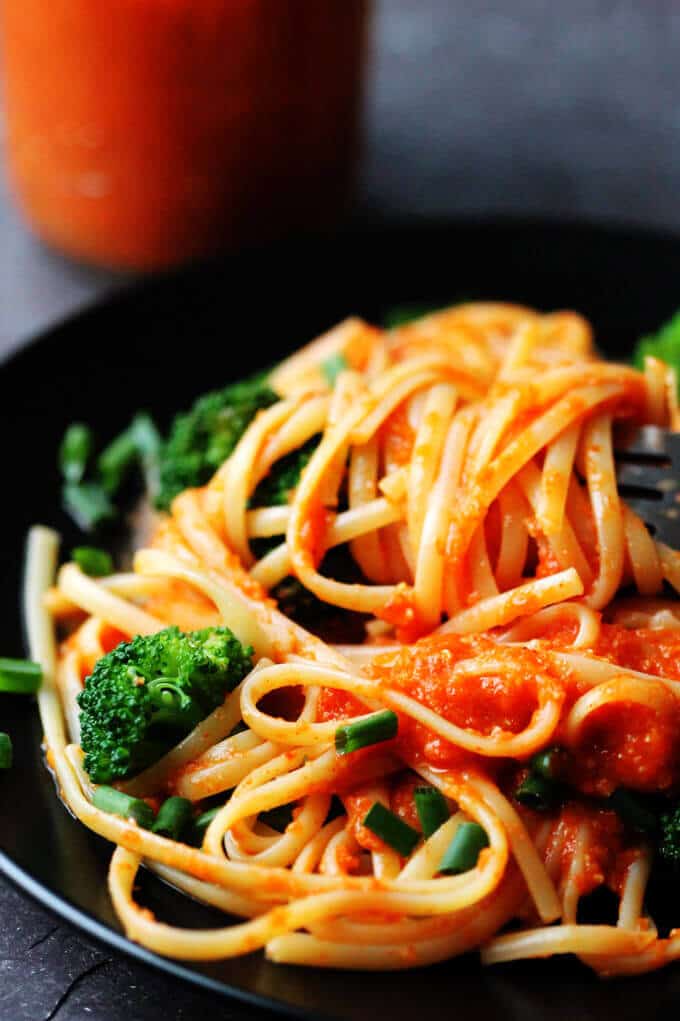 Linguine with Broccoli and Romesco Sauce is an amazing pasta dish with a uniquely Spanish twist. Freshly cooked linguine is tossed with broccoli and a sauce made of roasted red peppers, tomatoes, onions and toasted almonds. Simply delicious.