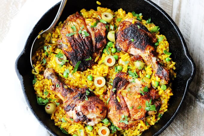 One Pot Chicken Saffron Rice with Olives and Piementon is an easy weeknight meal that requires minimum work. The oven does the job for you