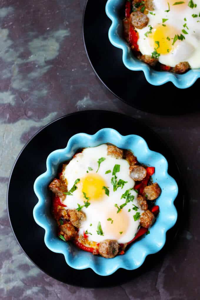Oven Baked Eggs with Sausage, Peppers & Onions are super easy to make yet absolutely delicious. They're also elegant and perfect for special occasions, like Mother's Day.