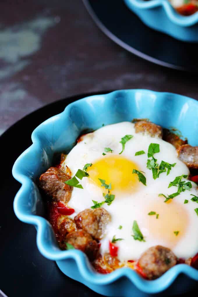 Oven Baked Eggs with Sausage, Peppers & Onions is super easy to make yet absolutely delicious. It's also elegant and perfect for special occasions like Mother's Day.