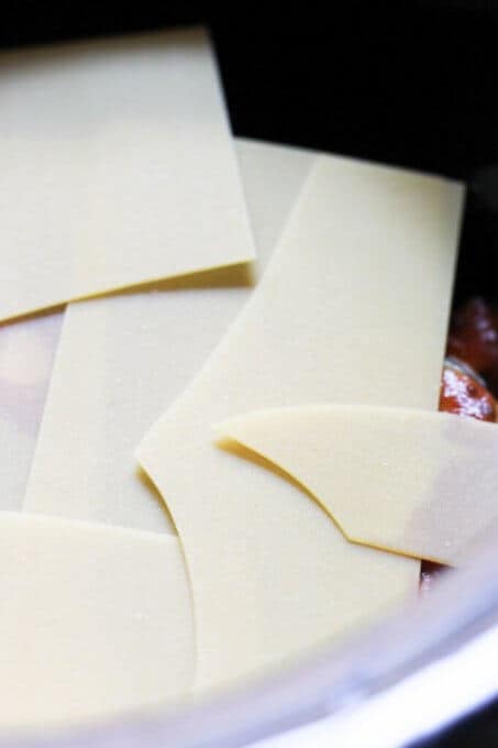 Slow Cooker Eggplant Lasagna is a perfect meal that uses seasonal ingredients like ripe eggplant and fresh basil; requires minimal preparation and it's done entirely in a slow cooker.