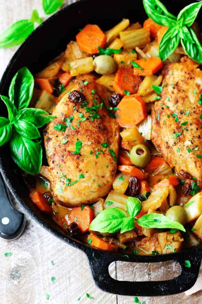 Fennel Chicken Mediterranean Style with carrots, raisins and olives is a very easy, one pot meal recipe for any day of the week. It is seasoned with cinnamon, cumin and smoked paprika for an irresistible and flavorful chicken dish.