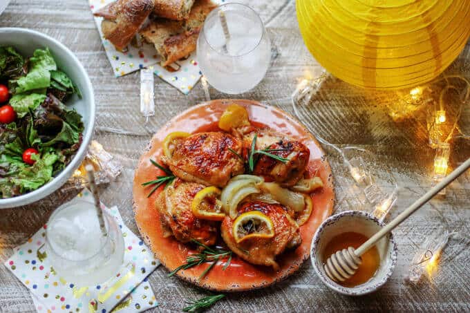  Baked Honey Lemon Chicken with Garlic and Rosemary is a fantastic dish for a date night in. It tastes super delicious, but requires minimal preparation. A win-win situation. #NationalHoneyMonth #SavorGoldenMoments #Ad