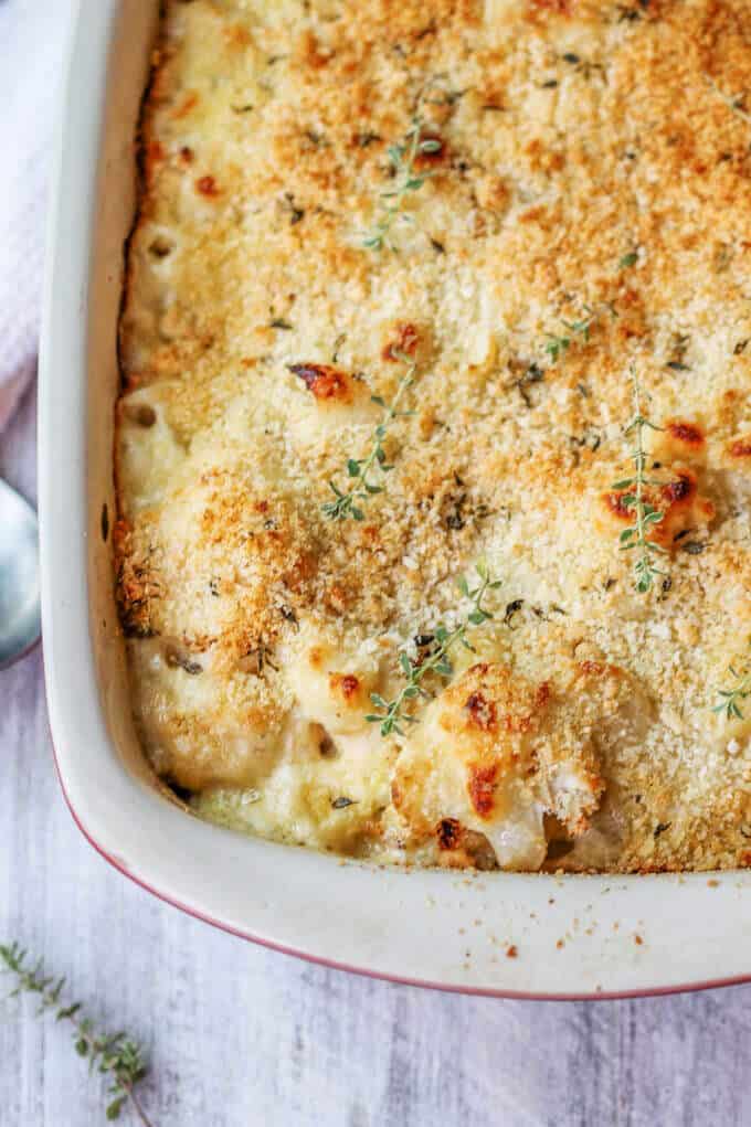 Cauliflower Pasta Bake with Brie and Fontina is like a combination of a fancy mac & cheese with veggies! Two dishes at ones. Cauliflower Pasta Bake in a baking dish