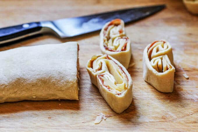 Mahon-Menorca Pinwheels with Fig Jam & Serrano Ham will be the appetizer that your whole family is clamoring for on Thanksgiving. Packed with flavor and quick to make - this appetizer is a winner. #Ad #MahonCheese