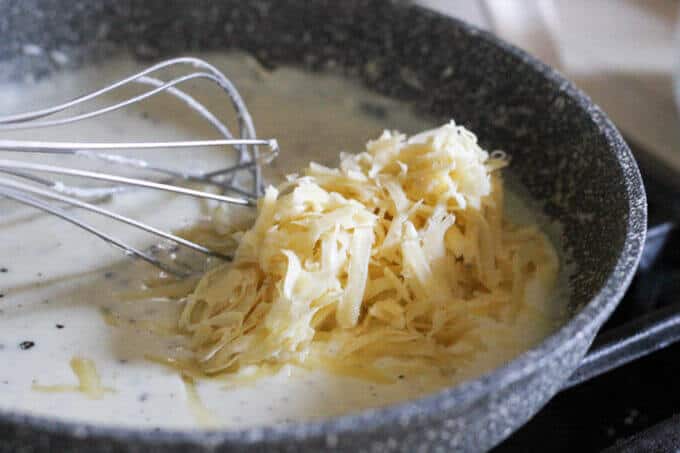 Pan-Seared Ribeye with Cracked Pepper & Mahon Menorca Cheese Sauce is a super easy and quick idea for any Holiday dinner. It just takes 15 minutes, from start to finish. You can’t beat that! #Ad #MahonCheese