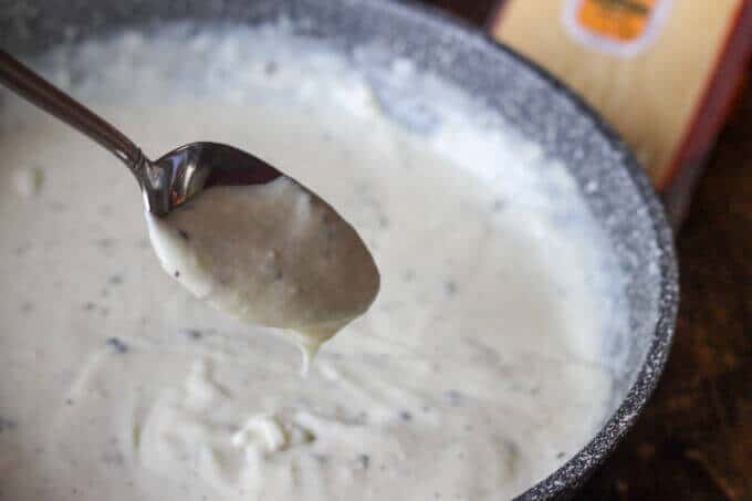 Pan-Seared Ribeye with Cracked Pepper & Mahon Menorca Cheese Sauce is a super easy and quick idea for any Holiday dinner. It just takes 15 minutes, from start to finish. You can’t beat that! #Ad #MahonCheese