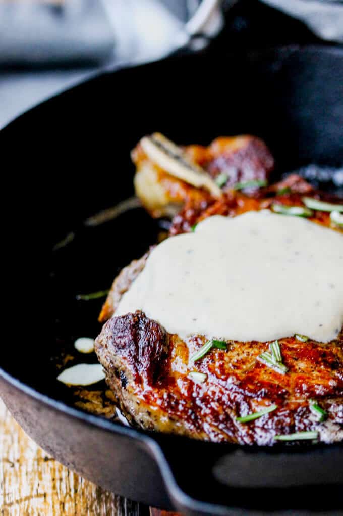 Pan-Seared Ribeye with Cracked Pepper & Mahon Menorca Cheese Sauce is a super easy and quick idea for any Holiday dinner. It just takes 15 minutes, from start to finish. You can’t beat that! #Ad #MahonCheese