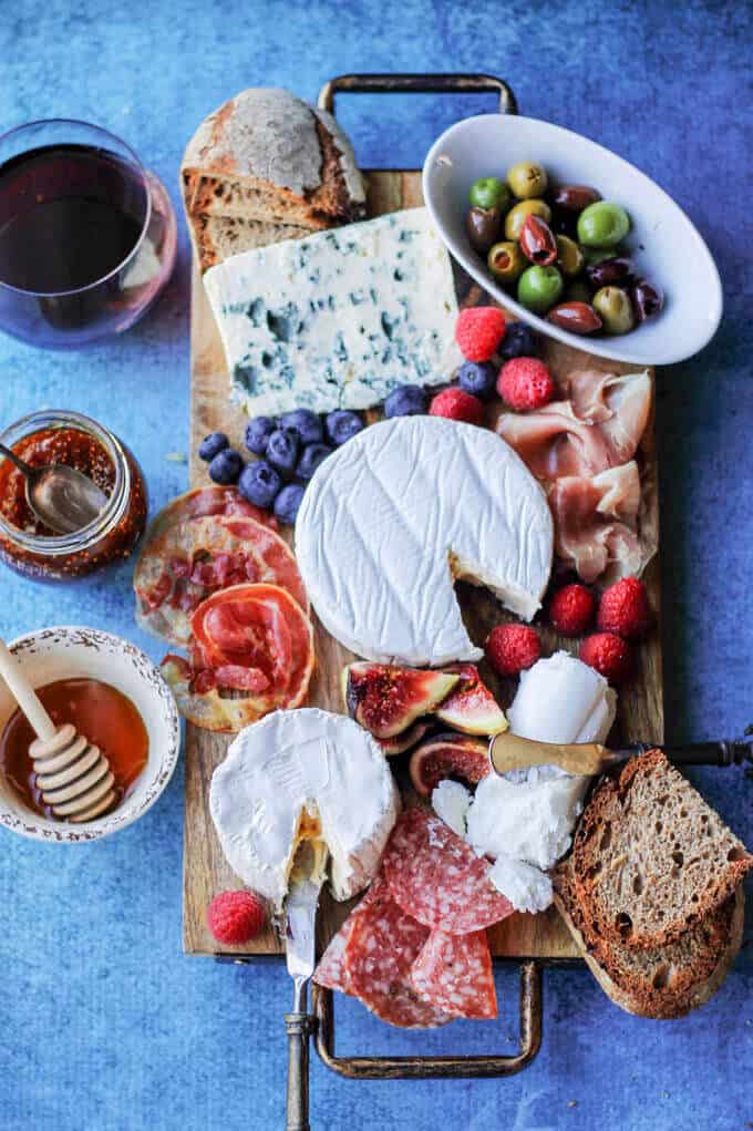 Building a Perfect French Cheese Board can be easier then one might thing. This guideline for cheese and wine pairings will help to make Holiday's appetizer round super easy yet decadent and very elegant. 
