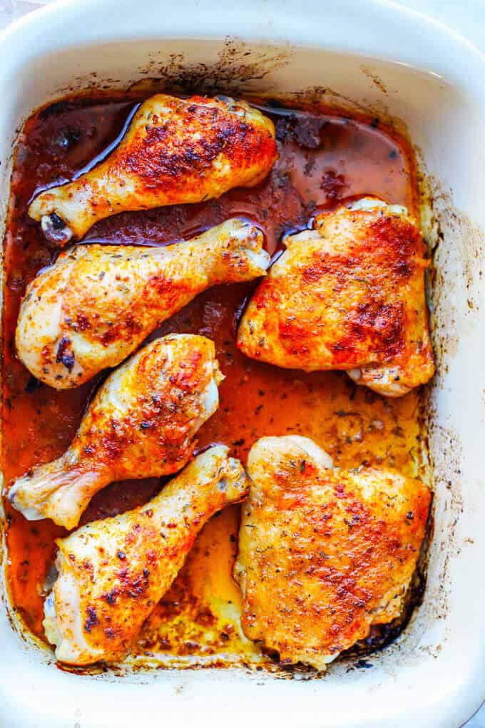 Oven Roasted Chicken Legs - either thighs, drumsticks, or even whole; can be the easiest dinner one can make when the time is scarce. 5 minutes prep time is all you'll need. Oven Roasted Chicken Legs (thighs and drumsticks) in casserole dish, vertical
