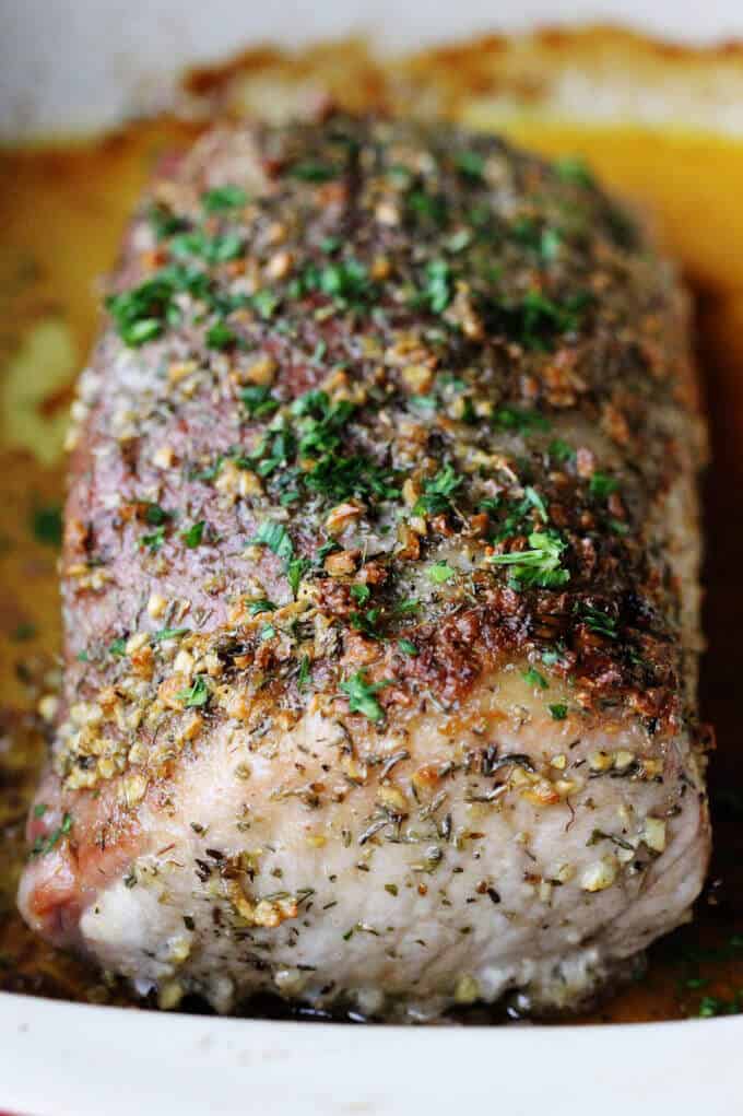 Brow Sugar Pork Loin with Garlic and Herbs in baking dish