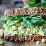 Smashed chickpea avocado feta sandwich, close up, horizontal