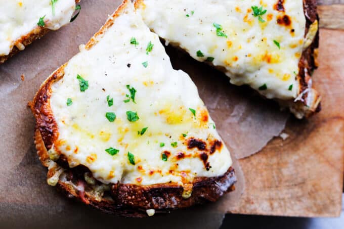 This Classic Croque Monsieur Recipe is easy to prepare and is a taste emersion right to the middle of Paris. For this recipe you can use any type of ham; so by all means, feel free to use any leftovers that you may have from this Easter. Classic Croque Monsieur sandwich cut up in halff
