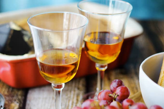 Italian Dessert wine Romandolo in glasses with desserts on a side