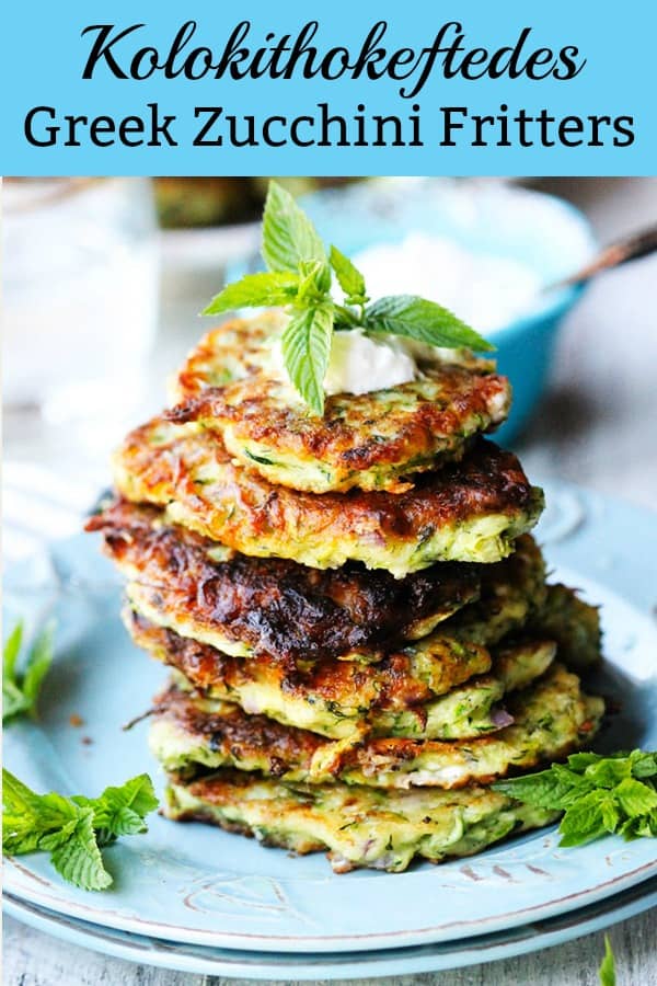Greek Zucchini Fritters on a blue plate