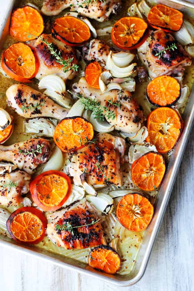 Baked Mustard Chicken on a sheet pan with clementines, onions and fennel