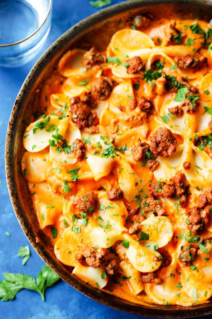 Pasta in vodka sauce with Italian Sausage in a skillet