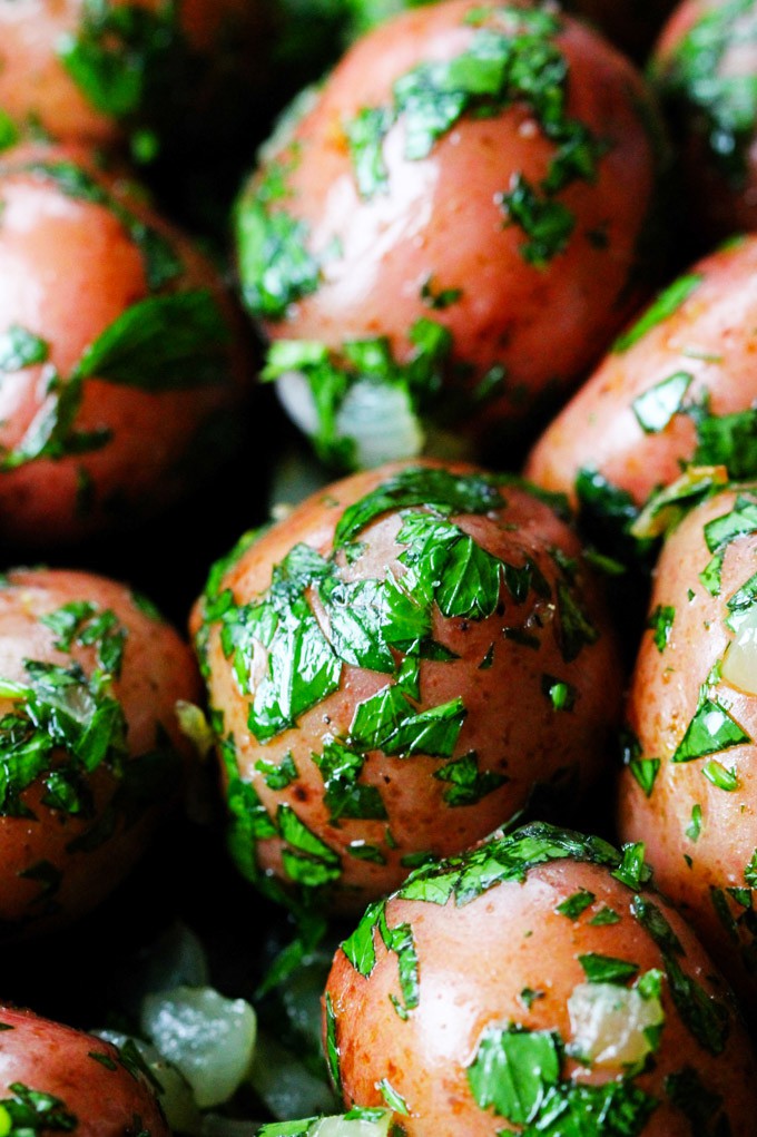 Parsley Potatoes are very easy to make. They very fragrant and filling, yet you only need 4 ingredients to make them! It's a perfect side dish for any meat or fish. Close up shot of parsley potaotes