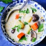 Homemade mushroom chunky soup in a blue bowl