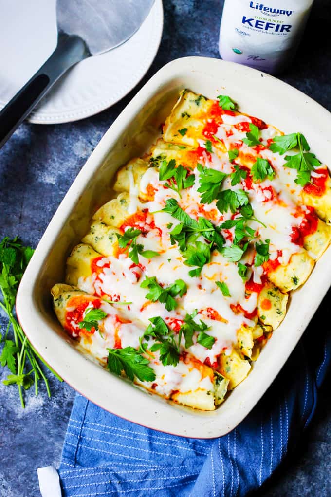 Crepes stuffed with chicken and baked with tomato sauce and mozzarella