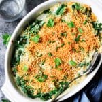 Green bean casserole in white baking dish