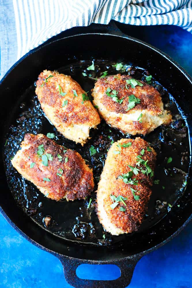 Chicken kiev in a black cast iron skillet