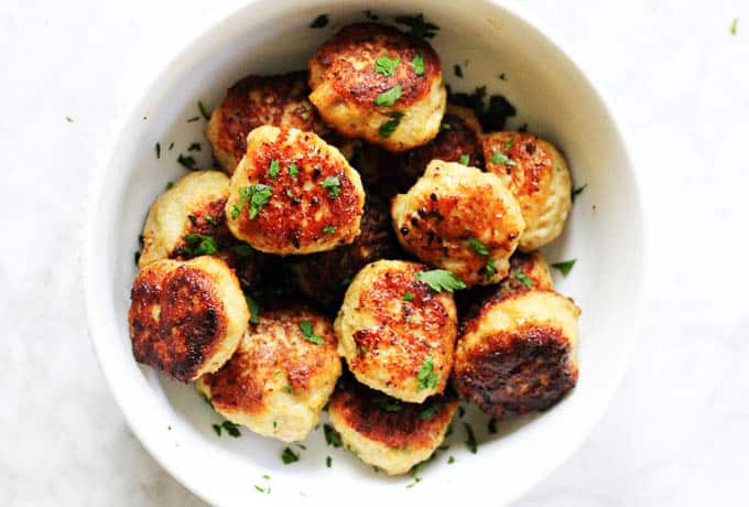 Chicken meatballs in a white bowl