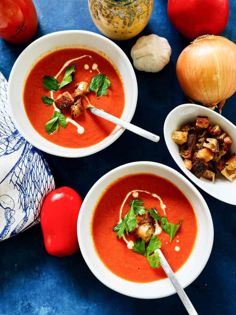 Tomato soup with croutons in bowls