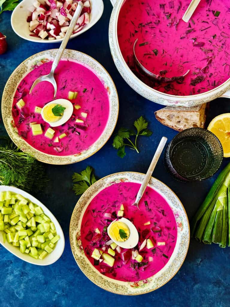 Overhead of 2 bowls of cold borscht