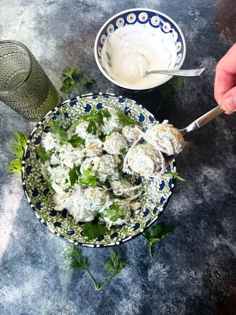 Serving new potato salad