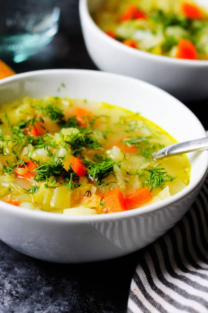 Cabbage soup recipe in a white bowl