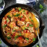 Pork tenderloin medallions in a skillet