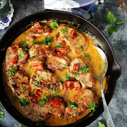 Pork tenderloin medallions in a skillet
