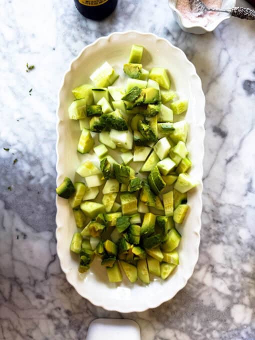 Avocado pieces added to the cucumber avocado feta salad 
