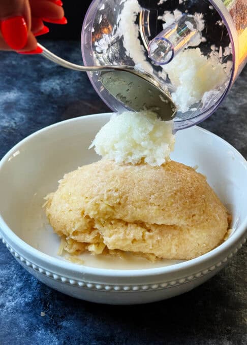 Adding the onion to the potatoes