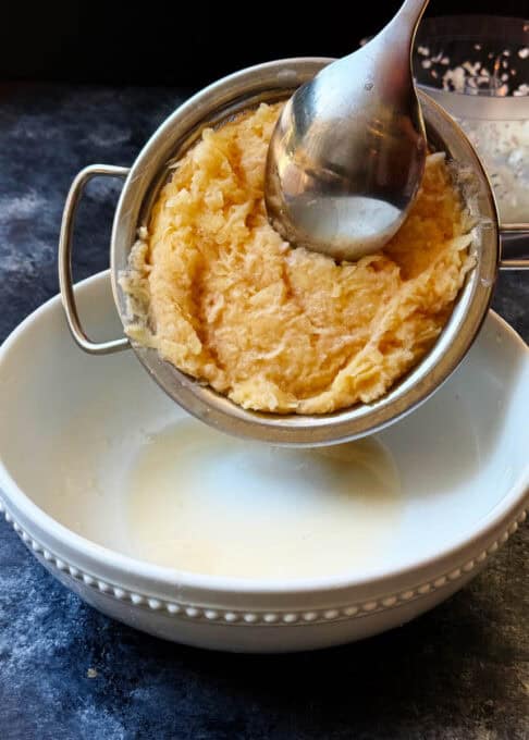 Place potatoes in bowl of starch
